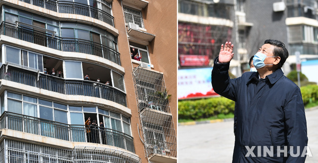 [우한=신화/뉴시스]시진핑 중국 국가주석이 10일(현지시간) 신종 코로나바이러스 감염증(코로나19) 발원지인 중국 후베이성 우한을 방문해 집에서 자가 격리 중인 주민들과 인사를 나누고 있다. 2020.03.11.