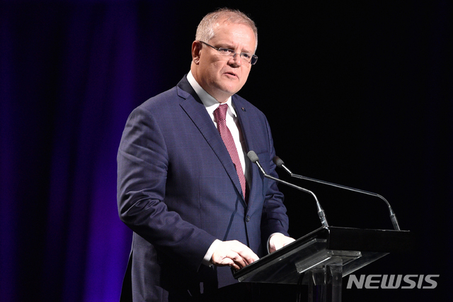 [시드니=AP/뉴시스] 스콧 모리슨 호주 총리는 1일 시드니 라디오 방송국 2GB와의 인터뷰에서 "도널드 트럼프 미국 대통령은 호주가 G7 정상회의에 참석하길 바랐다"며 "우리 역시 초청을 환영한다"고 말했다. 사진은 지난 2월 시드니 의회에서 연설 중인 모리슨 총리의 모습. 2020.6.1.