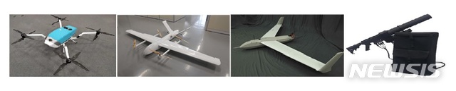 [서울=뉴시스]왼쪽부터 해안경계용 수직이착륙 드론(회전익), 감시·정찰용 수직이착륙 드론(고정익), 원거리 정찰용 소형 무인기, 휴대용 안티드론 건(Anti-drone Gun). 2020.05.27. (사진=방위사업청 제공) photo@newsis.com