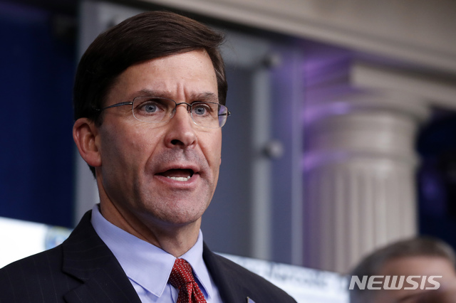 FILE - In this April 1, 2020, file photo, Defense Secretary Mark Esper speaks about the coronavirus in the James Brady Press Briefing Room of the White House in Washington. (AP Photo/Alex Brandon, File)