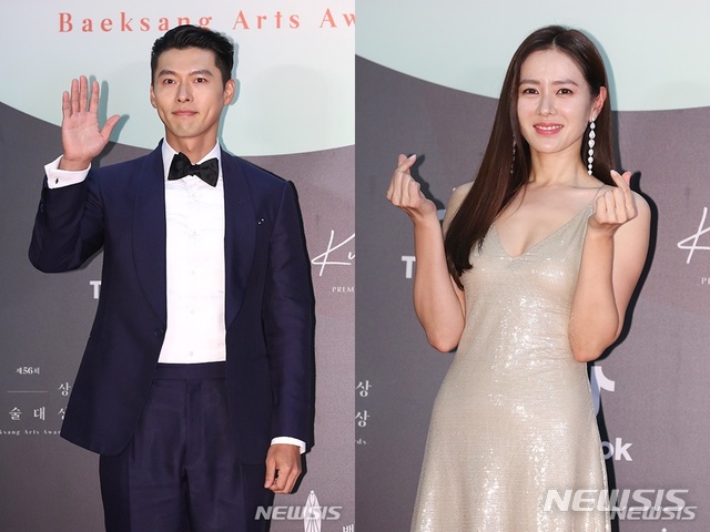 [서울=뉴시스] 배우 현빈과 손예진인 5일 경기 일산 킨텍스에서 열린 '제56회 백상예술대상(2020)' 레드카펫 포토월 행사에서 포즈를 취하고 있다. (사진=백상예술대상 사무국 제공) 2020.06.05. 