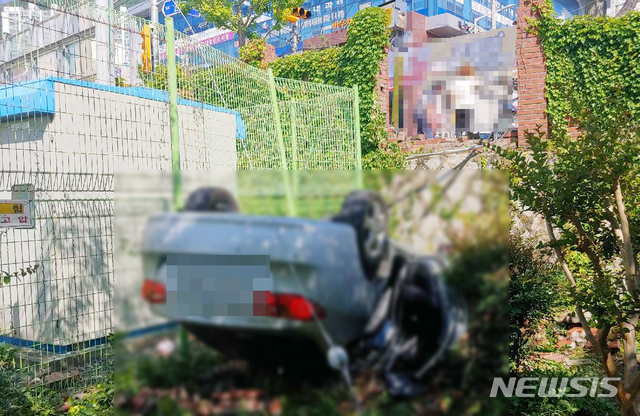 [부산=뉴시스] 부산 해운대구의 한 초등학교 앞에서 승용차가 인도를 덮쳐 유치원생 A(6)양과 A양의 어머니를 치었다. (사진=부산경찰청 제공)