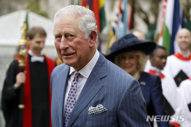 FILE - In this Monday, March 9, 2020 file photo, Britain's Prince Charles and Camilla the Duchess of Cornwall, in the background, leave after attending the annual Commonwealth Day service at Westminster Abbey in London. Prince Charles has warned that up to 1 million young people may need “urgent help’’ to protect their futures from the ravages of the COVID-19 pandemic, it was reported on Sunday, Sept. 27, 2020. Writing in the Sunday Telegraph, the Prince of Wales said the crisis is reminiscent of the upheavals of the 1970s, when youth unemployment was one of the pressing issues facing British society. (AP Photo/Kirsty Wigglesworth, File)