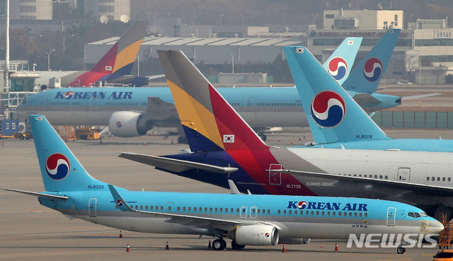 대한항공-아시아나 통합...카드사 마일리지 어떻게 바뀌나