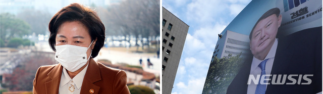 [서울=뉴시스]이영환 김선웅 기자 = 추미애 법무부 장관이 윤석열 검찰총장에 대한 징계 청구와 직무집행 정지 명령을 내린지 사흘이 지난 27일 오전 추 법무부장관(사진 왼쪽)이 경기 과천시 정부과천청사 법무부로 출근하고 윤 검찰총장 지지자들이 서울 서초구 대검찰청 앞에 세워둔 입간판 모습 이다. 2020.11.27.photo@newsis.com