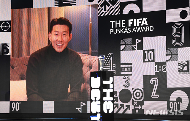 South Korea's Son Heung-min smiles as he is interviewed after he won the Puskas award at the Best FIFA Football Awards Ceremony in Zurich, Switzerland, Thursday, Dec. 17, 2020. (Valeriano Di Domenico/Pool via AP)