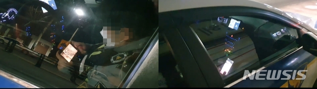 [인천=뉴시스]정일형 기자=지난 2일 오후 9시30분께 인천 갈산동 북초등학교 인근에서 인천 삼산경찰서 갈산지구대 소속 경찰관 2명이 순찰차량에서 유튜브를 보고 있다. 동영상 캡처.(독자 제공) 2021.3.5. jih@newsis.com  