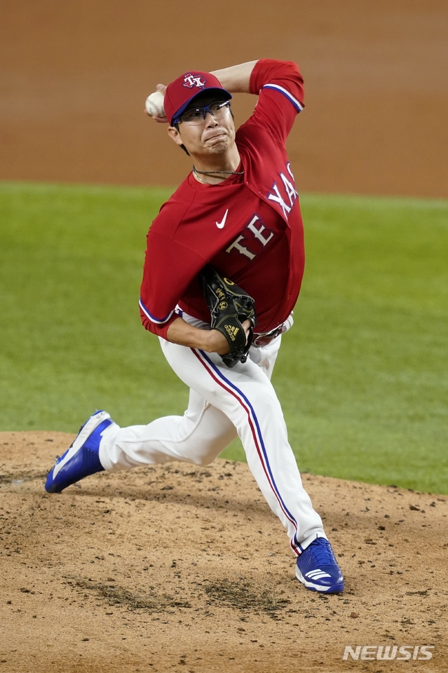 Texas Rangers pitcher Hyeon-Jong Yang throws to a Boston Red Sox during the third inning of a baseball game in Arlington, Texas, Friday, April 30, 2021. (AP Photo/Tony Gutierrez)