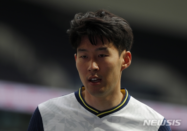 Tottenham's Son Heung-min looks on during the English Premier League soccer match between Tottenham Hotspur and Wolverhampton Wanderers at Tottenham Hotspur Stadium in London, England, Sunday, May 16, 2021. (AP Photo/Adrian Dennis, Pool)