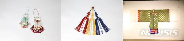 [전주=뉴시스]윤난슬 기자 = 한국전통문화전당 전주공예품전시관이 특별기획전 '복식'을 내달 4일까지 진행한다고 29일 밝혔다. 궁중 귀주머니(자수) 전경례 교수·낙지발 삼작노리개(매듭) 김선자 교수·원삼(침선) 박순자 교수 작품.(사진=전당 제공) 