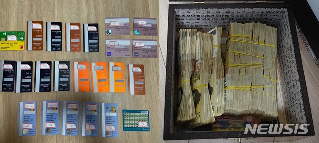 [부천=뉴시스] 정일형 기자=보이스피싱 일당들로부터 압수한 카드와 현금. (사진은 원미경찰서 제공)