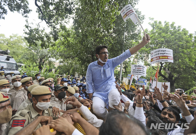 Congress party workers shout slogans during a protest accusing Prime Minister Narendra Modi’s government of using military-grade spyware to monitor political opponents, journalists and activists in New Delhi, India, Tuesday, July 20, 2021. The protests came after an investigation by a global media consortium was published on Sunday. Based on leaked targeting data, the findings provided evidence that the spyware from Israel-based NSO Group, the world’s most infamous hacker-for-hire company, was used to allegedly infiltrate devices belonging to a range of targets, including journalists, activists and political opponents in 50 countries. (AP Photo/Manish Swarup)