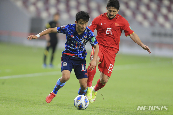 [도하=AP/뉴시스]일본이 중국을 꺾고 월드컵 최종예선 첫 승에 성공했다. 2021.09.07.