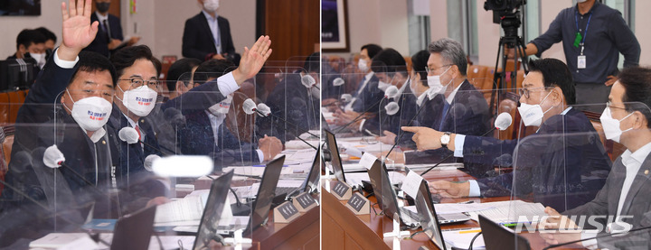 [서울=뉴시스] 최진석 기자 = 8일 국회에서 열린 국토교통위원회 국정감사에서 민주당 김교흥(오른쪽사진 손짓) 의원 등이 국민의힘을 향해 대장동 개발에 대한 질문을 하지말고 피감기관인 도로공사에 대한 질의를 하라고 주장 하자 국민의힘 의원(왼쪽)들이 항의하며 고성으로 발언권을 신청하고 있다. (공동취재사진) 2021.10.08. photo@newsis.com