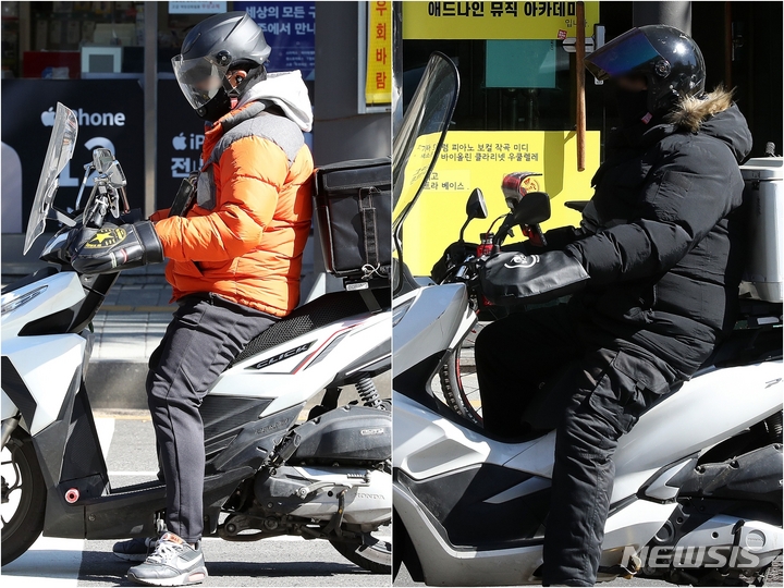 [서울=뉴시스] 백동현 기자 = 전국 대부분 지역에 한파특보가 내려진 지난 17일 오전 서울 마포구 망원로 일대에서 오토바이 배달원들이 방한용품을 착용하고 근무하고 있다. 서울에 10월 중 한파특보가 내려진 것은 2004년 이후 17년 만에 처음이다. 2021.10.17. livertrent@newsis.com