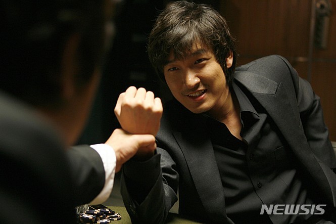 [서울=뉴시스] 타짜 (사진=씨제이이앤엠 제공) 2021.11.29. photo@newsis.com