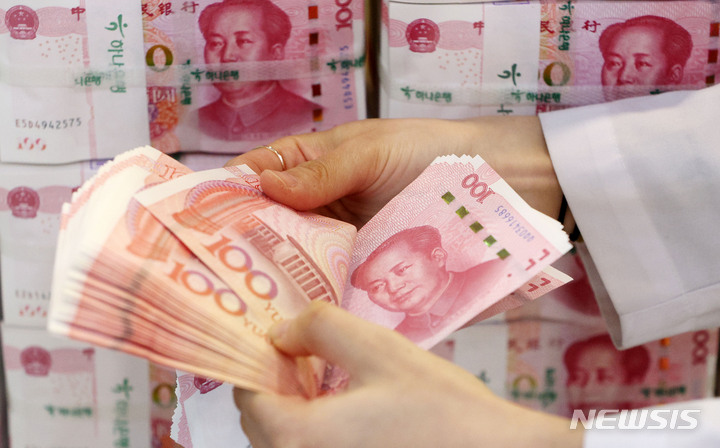 [올댓차이나] 위안화 기준치 1달러=6.8752위안...0.34% 절상