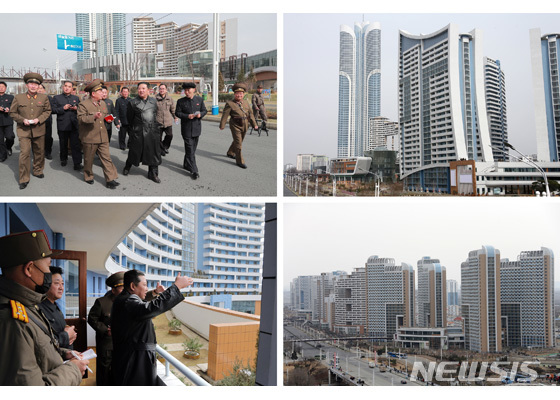[서울=뉴시스]16일 북한 조선노동당 기관지 노동신문은 김정은 당 총비서 겸 국무위원장이 평양 송신·송화지구 1만 세대 살림집 건설 현장을 방문했다고 보도했다. (사진=노동신문 홈페이지 갈무리) 2022.03.16. 