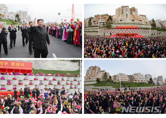 [서울=뉴시스] 14일 북한 조선노동당 기관지 노동신문은 지난 13일 김정은 당 총비서 겸 국무위원장이 보통강 강안 다락식 주택구 준공식에 참석했다고 보도했다. (사진=노동신문 홈페이지 갈무리) 2022.04.14 