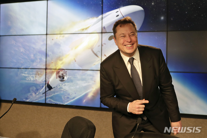 FILE - Elon Musk, CEO  of SpaceX speaks during a news conference at the Kennedy Space Center in Cape Canaveral, Fla., on Jan. 19, 2020.  Many people are puzzled on what a Elon Musk takeover of Twitter would mean for the company and even whether he’ll go through with the deal.