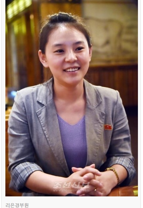 [서울=뉴시스]북한 삼계탕집 직원 리은경씨. 2022.08.07. (사진=조선신보 누리집 갈무리)&nbsp; *재판매 및 DB 금지