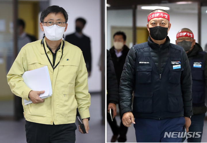 [세종=뉴시스] 강종민 기자 = 구헌상 국토교통부 물류정책관과 김태영 화물연대본부 수석부위원장이 30일 2차 교섭을 위해 세종시 정부세종청사에서 이동하고 있다. 2022.11.30. ppkjm@newsis.com