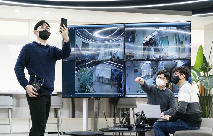 [서울=뉴시스] SK텔레콤이 분당 사옥에 구축한 5G오픈랜 인빌딩(실내) 실증망의 안정적인 서비스 연동 품질을 확인했다. (사진=SKT 제공) *재판매 및 DB 금지