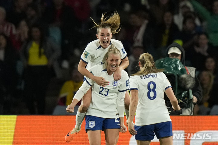 England's Alessia Russo (23) celebrates after scoring her side's 2nd goal during the Women's World Cup quarterfinal soccer match between England and Colombia at Stadium Australia in Sydney, Australia, Saturday, Aug. 12, 2023. (AP Photo/Rick Rycroft)