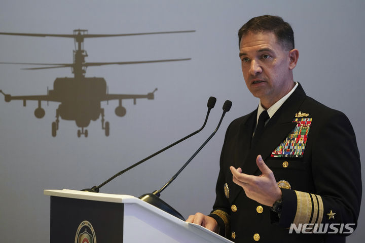 FILE - U.S. Navy Vice Adm. Brad Cooper, who heads the Navy's Bahrain-based 5th Fleet, speaks at an event at the International Defense Exhibition and Conference in Abu Dhabi, United Arab Emirates, Feb. 21, 2023. Iran is "very directly involved" in attacks by Yemen's Houthi rebels on shipping over Israel's war on Hamas in the Gaza Strip, Cooper told The Associated Press on Monday, Jan. 22, 2024. (AP Photo/Jon Gambrell, File)