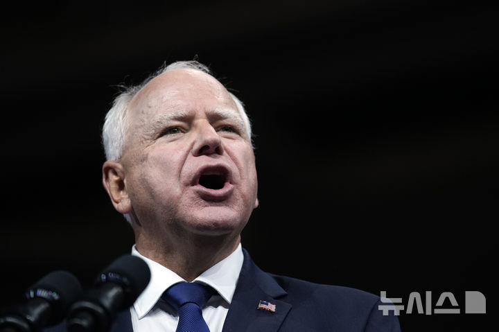 Democratic vice presidential nominee Minnesota Gov. Tim Walz appears with Democratic presidential nominee Vice President Kamala Harris at a campaign rally in Philadelphia, Tuesday, Aug. 6, 2024. (AP Photo/Matt Rourke)