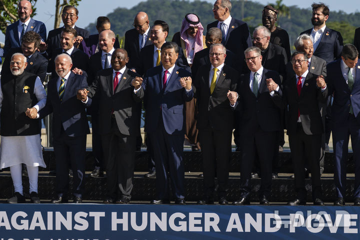 G20 leaders pose for a group photo at the G20 Summit in Rio de Janeiro, Monday, Nov. 18, 2024. (Eric Lee/The New York Times via AP, Pool)