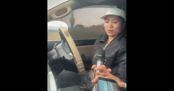 [서울=뉴시스] 베트남에서 운전 중 마이크를 들고 노래를 부르는 여성의 영상이 공개돼 논란이 일고 있다. (사진=docnhanh) *재판매 및 DB 금지