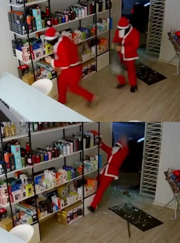 [서울=뉴시스] 크리스마스를 앞두고 브라질에서 산타클로스 복장을 한 2인조 강도가 전자제품 매장을 털고 달아난 사건이 발생했다. (사진=TMZ) *재판매 및 DB 금지