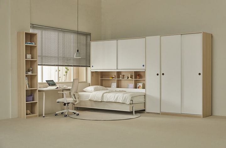 [서울=뉴시스] 리모컨을 눌러 책장과 침대로 다르게 활용할 수 있는 '히든베드'. (사진=에넥스 제공) 2025.02.02. photo@newsis.com *재판매 및 DB 금지