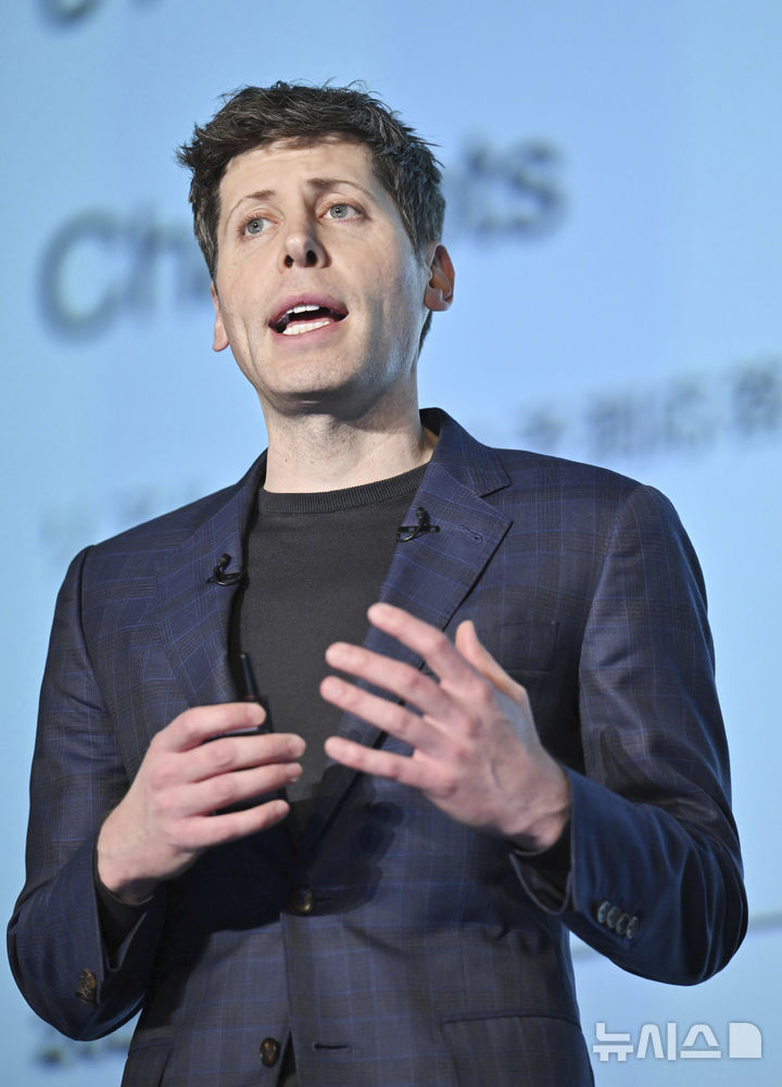 OpenAI Chief Sam Altman delivers a speech during an event for enterprises, with SoftBank Chief Masayoshi Son, in Tokyo, in Tokyo, Monday, Feb. 3, 2025. (Kyodo News via AP)