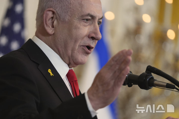 Israel's Prime Minister Benjamin Netanyahu speaks during a news conference With President Donald Trump in the East Room of the White House, Tuesday, Feb. 4, 2025, in Washington. (AP Photo/Evan Vucci)