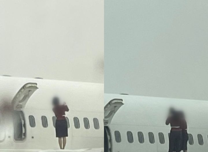 [서울=뉴시스] 폭설로 항공기가 결항돼 승객들이 1시간 이상 대기하는 등 불편을 겪는 와중에 승무원이 항공기 날개 위에 올라가 인증샷을 찍어 논란이 일고 있다. (사진=JTBC) *재판매 및 DB 금지