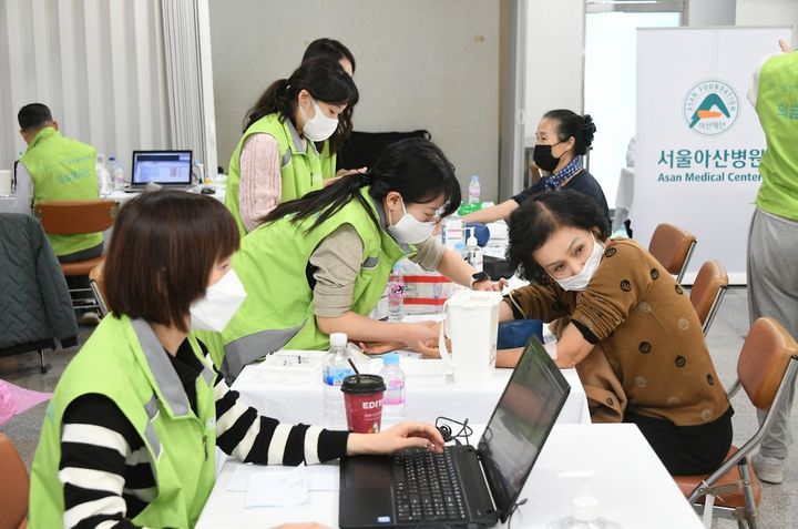 아산병원 의료봉사 활동. *재판매 및 DB 금지