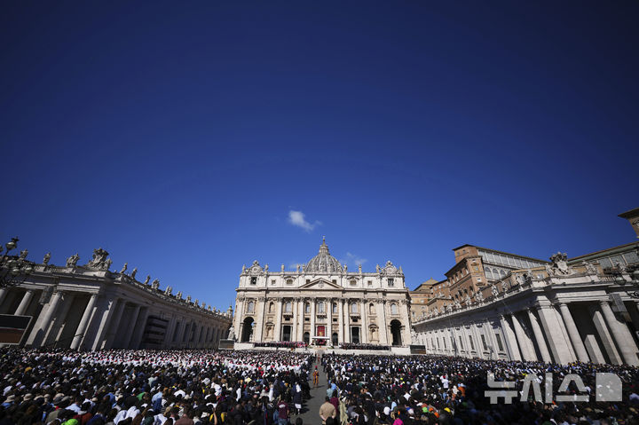 Faithful crowd St Peter's Square for the funeral of Pope Francis, at the Vatican, Saturday, April 26, 2025. (AP Photo/Andrew Medichini)