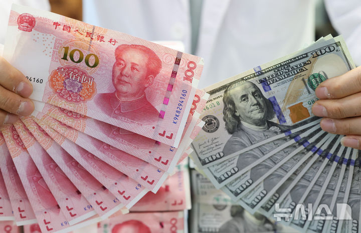 [올댓차이나] 위안화 기준치 1달러=6.9771위안…0.023% 절하
