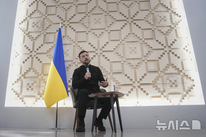 Ukrainian President Volodymyr Zelenskyy talks to journalists at the Ukrainian Embassy in Ankara, Turkey, Thursday, May 15, 2025. (AP Photo/Evgeniy Maloletka)