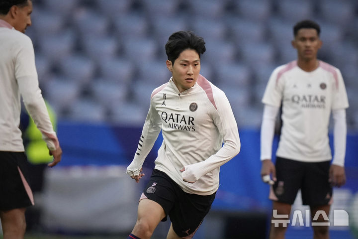 PSG's Lee Kang-in follows the ball during a training session ahead of the Champions League final soccer match between Paris Saint-Germain and Inter Milan at the Allianz Arena in Munich, Germany, Friday, May 30, 2025. (AP Photo/Matthias Schrader)
