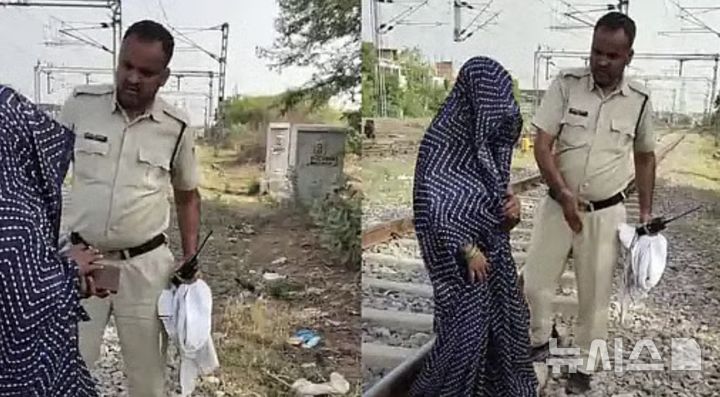 [뉴시스] 남편으로부터 폭언을 들은 인도의 한 여성이 아들과 함께 죽을 결심으로 철로에 앉아 기차를 기다렸다. (사진=프리프레스저널) 2025.6.10 