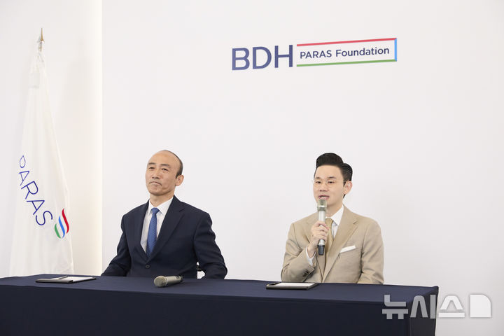 [서울=뉴시스]정진완 장애인체육회장과 배동현 이사장. (사진=대한장애인체육회 제공)