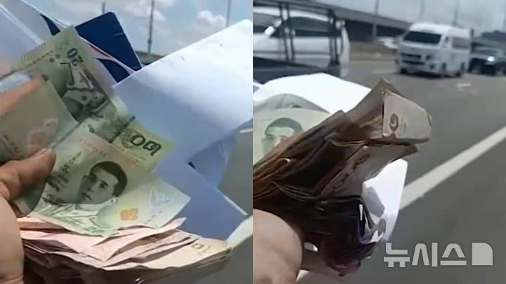 [뉴시스] 방콕의 한 고속도로에서 현금이 도로 위로 흩날리며 교통체증으로 이어졌다. (사진=채널7) 