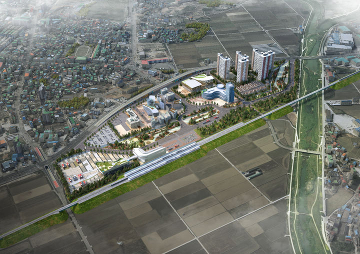 [통영=뉴시스][고성(경남)=뉴시스] 신정철 기자= 경남 고성군이 29일 군청 중회의실에서 언론 브리핑을 갖고 남부내륙철도 KTX 고성역세권 개발사업 추진계획, 무인기 종합타운 조성계획, 일자리연계형 지원주택 건립사업 추진계획을 발표했다.사진은 남부내륙철도 KTX 고성역세권 개발지역 항공사진.(사진=고성군 제공)2025.07.29. photo@newsis.com *재판매 및 DB 금지