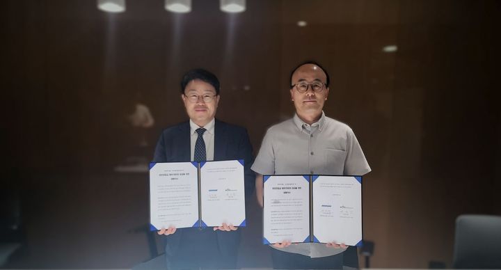 서상민 우리기술 시스템사업부문 부사장(왼쪽), 김성태 두산에너빌리티 원자력I&C사업부 상무(오른쪽). (사진=우리기술) *재판매 및 DB 금지