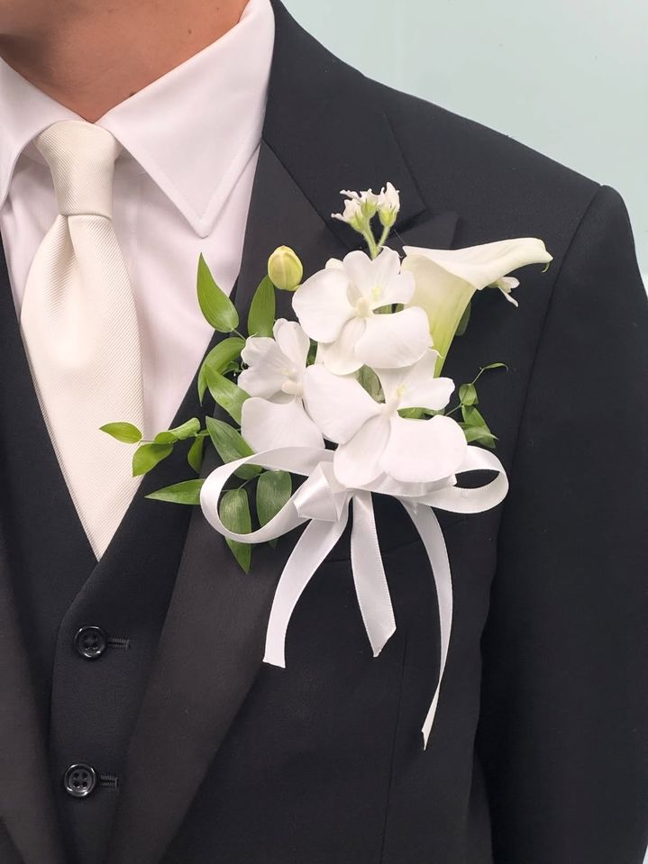 [뉴시스] 신랑이 착용한 부토니에. (사진=스레드 캡처) *재판매 및 DB 금지