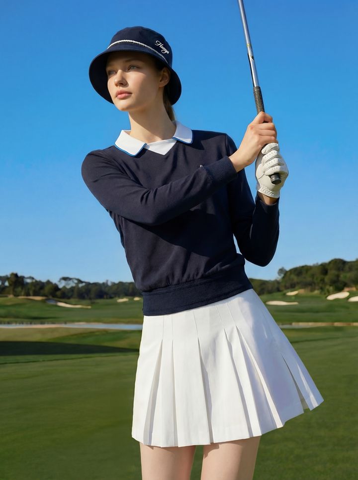 [서울=뉴시스] 헤지스 골프 2026 SS 로얄 네이비 웨이브 컬렉션 화보. (사진=LF 제공) *재판매 및 DB 금지