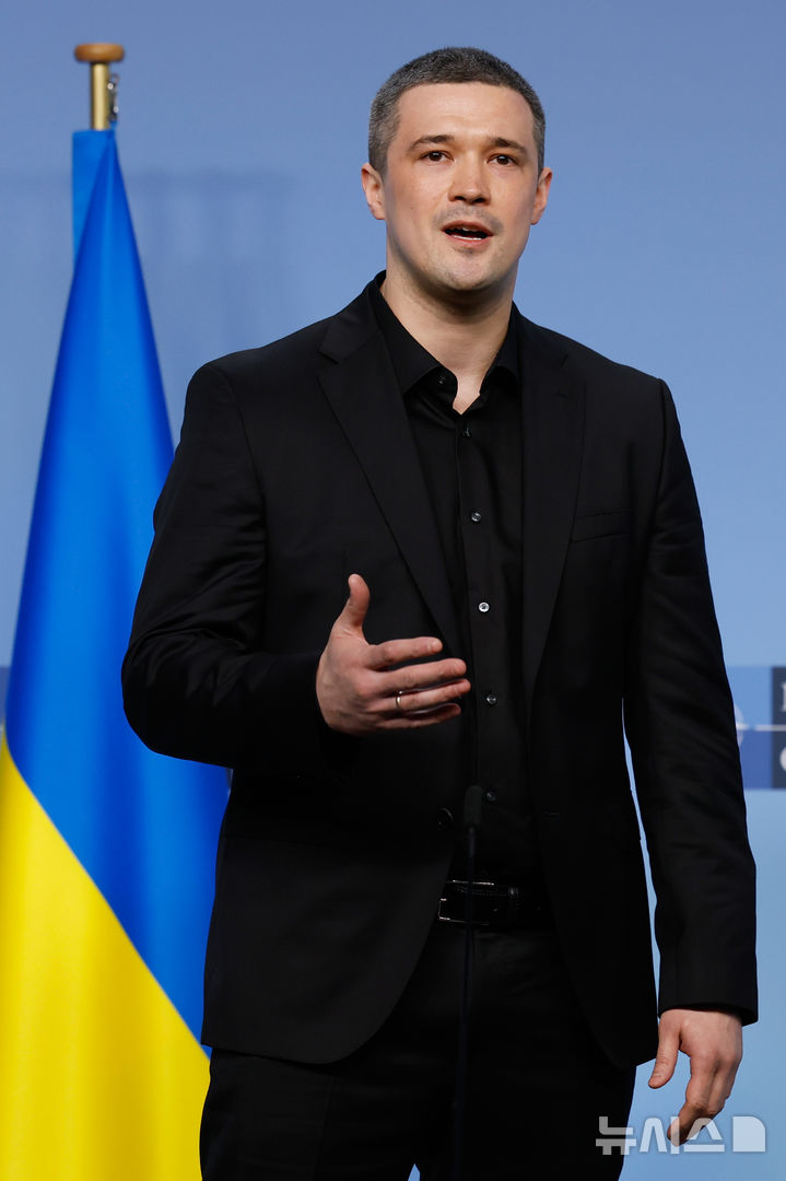 Ukraine's Defense Minister Mykhailo Fedorov addresses the media at NATO headquarters in Brussels, Thursday, Feb. 12, 2026. (AP Photo/Geert Vanden Wijngaert)
